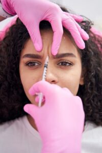 Patient receiving Botox injections for chronic migraine treatment